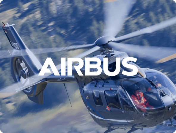 close up action shot of helicopter flying with airbus logo overlay